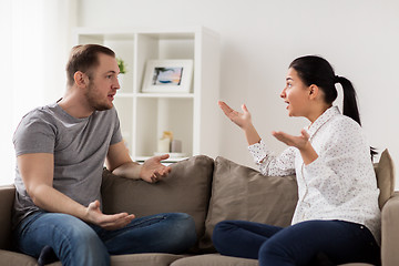 Image showing unhappy couple having argument at home