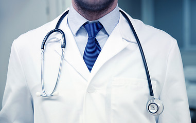 Image showing close up of doctor with stethoscope at hospital