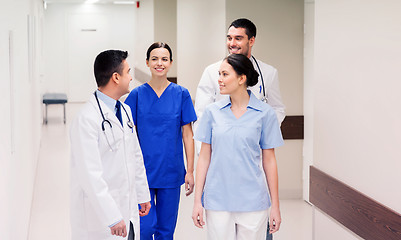 Image showing group of happy medics or doctors at hospital