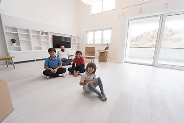 Image showing portrait of happy young boys with their dad