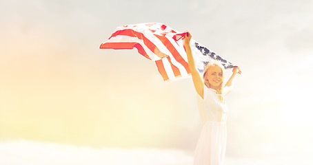 Image showing happy woman with american flag outdoors