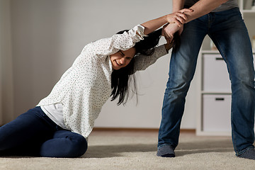 Image showing unhappy woman suffering from home violence