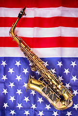 Image showing saxophone and USA flag