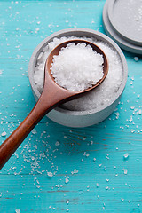 Image showing sea salt in stone bowl and wooden spoon