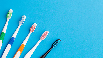 Image showing Five toothbrushes, place for inscription