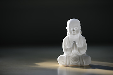 Image showing plastic small buddha sculpture