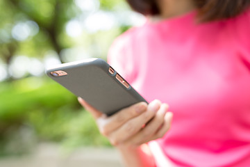 Image showing Woman use of phone at outdoor park