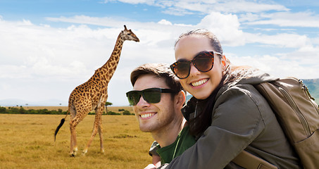 Image showing happy couple with backpacks traveling in africa