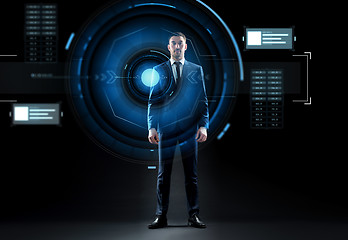 Image showing businessman in suit with virtual projection