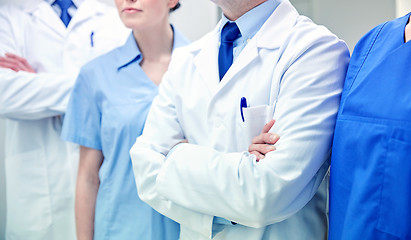 Image showing close up of medics or doctors at hospital corridor