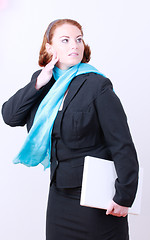 Image showing Businesswoman with laptop and Oversize