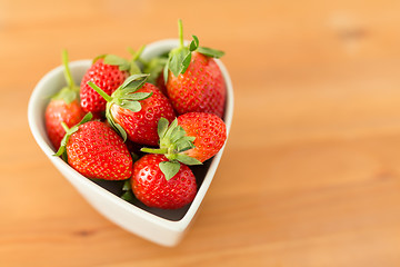 Image showing Fresh Strawberry in heart shape bowl