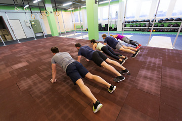 Image showing group of people exercising in gym