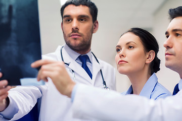 Image showing group of medics with spine x-ray scan at hospital