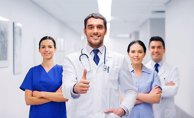 Image showing medics or doctors at hospital showing thumbs up