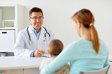 Image showing happy woman with baby and doctor at clinic