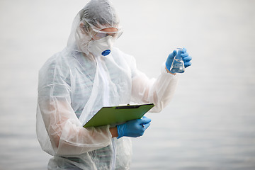 Image showing Ecologist with bulb and folder