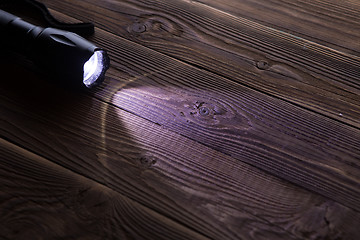 Image showing Wooden texture with flashlight on