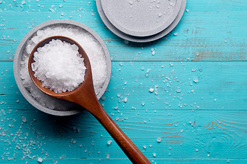 Image showing sea salt in stone bowl and wooden spoon