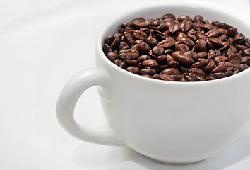 Image showing Simple White Coffee Cup Filled With Roasted Beans