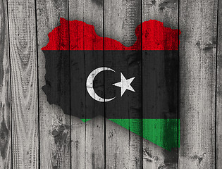 Image showing Map and flag of Libya on weathered wood