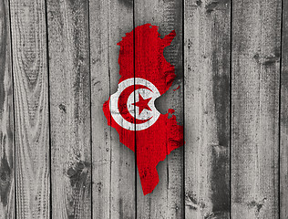 Image showing Map and flag of Tunisia on weathered wood