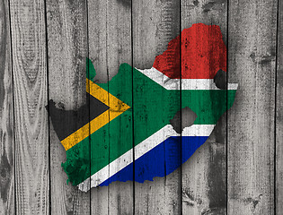 Image showing Map and flag of South Africa on weathered wood