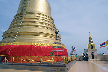 Image showing Near golden stupa