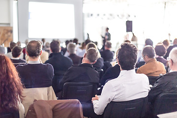 Image showing Business speaker giving a talk at business conference event.