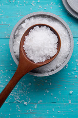 Image showing sea salt in stone bowl and wooden spoon