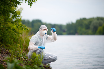 Image showing Laboratory assistant with bulb, summer