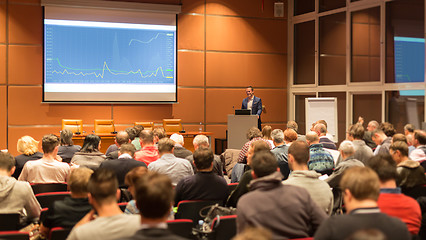 Image showing Business speaker giving a talk at business conference event.