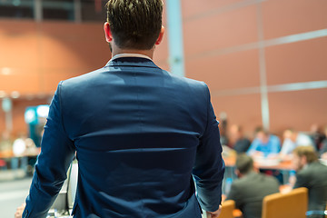 Image showing Public speaker giving talk at Business Event.