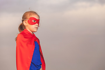 Image showing Happy little child playing superhero.