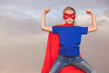 Image showing Happy little child playing superhero.