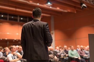 Image showing Public speaker giving talk at Business Event.