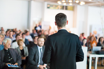 Image showing Public speaker giving talk at Business Event.