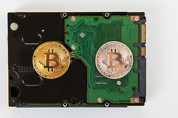 Image showing Bitcoin coin with HDD