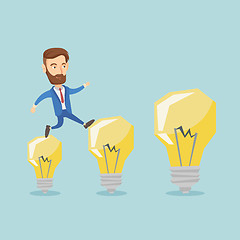 Image showing Business man jumping on light bulbs.