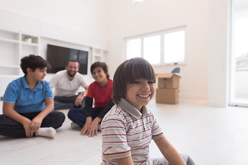 Image showing portrait of happy young boys with their dad