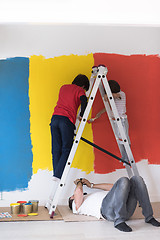 Image showing boys painting wall