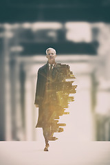 Image showing Double exposure of senior businessman