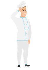 Image showing Young caucasian chef cook in uniform.