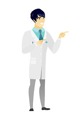 Image showing Young asian doctor pointing to the side.