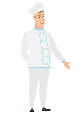 Image showing Caucasian chef cook with hand in his pocket.