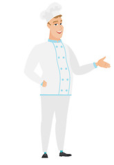 Image showing Chef cook with arm out in a welcoming gesture.