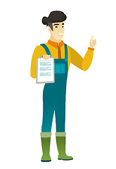 Image showing Farmer with clipboard giving thumb up.