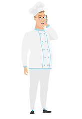 Image showing Chef cook talking on a mobile phone.