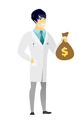 Image showing Asian doctor holding a money bag.