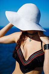 Image showing Anonymous model in swimwear and hat